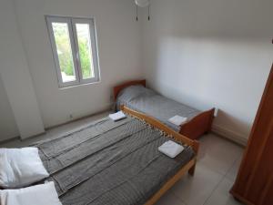 Postel nebo postele na pokoji v ubytování Apartments Prosika
