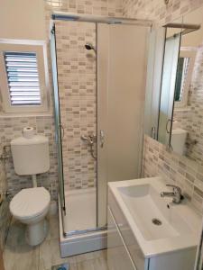 Koupelna v ubytování Apartments Prosika