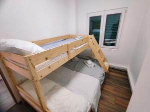 Postel nebo postele na pokoji v ubytování Apartments Prosika