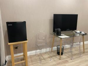 TV a/nebo společenská místnost v ubytování B&B The Garden