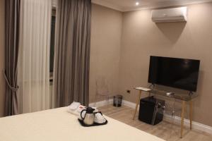 TV a/nebo společenská místnost v ubytování B&B The Garden