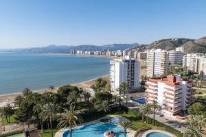 Blick auf den Strand, die Gebäude und das Meer in der Unterkunft Florazar 2, Vi-13-C in Cullera