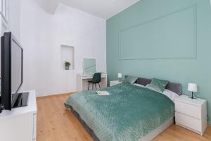 Posteľ alebo postele v izbe v ubytovaní Brzozowa Apartment by Hostly
