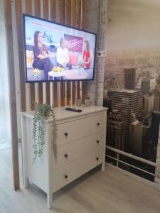 TV a/nebo společenská místnost v ubytování Ferienwohnung Lavanda