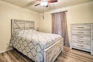 a bedroom with a bed and a dresser at Convenient Las Cruces Home with Patio and Grill! in Las Cruces