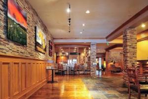 a lobby of a hotel with a bar at King Bed Condo at Cedar Breaks Lodge in Brian Head