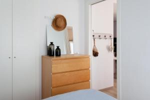 A bed or beds in a room at LLAFRANC 100 - calle Coral-
