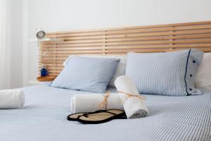 A bed or beds in a room at LLAFRANC 100 - calle Coral-