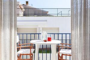 A balcony or terrace at LLAFRANC 100 - calle Coral-