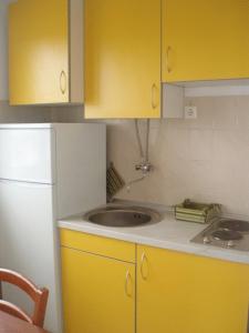 Una cocina o zona de cocina en Salvia Apartments