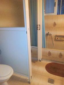 A bathroom at Vacations in Patra Rooms