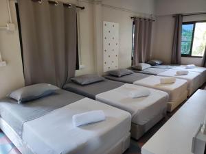 Postel nebo postele na pokoji v ubytování Sea Tong