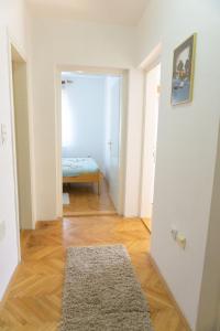 Postel nebo postele na pokoji v ubytování Apartment Sunshine