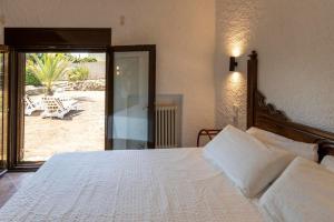 Postel nebo postele na pokoji v ubytování Villa Ventisca + 31 fotografií