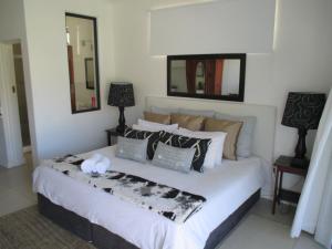 Ein Bett oder Betten in einem Zimmer der Unterkunft Radium Hall Guest House