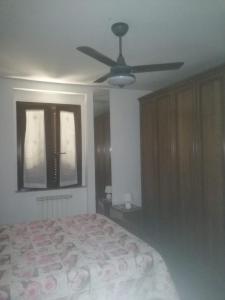 Letto o letti in una camera di Sulle orme di Francesco appartamento verde