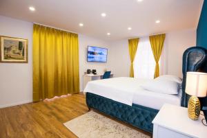 Posteľ alebo postele v izbe v ubytovaní Gold Luxury Room