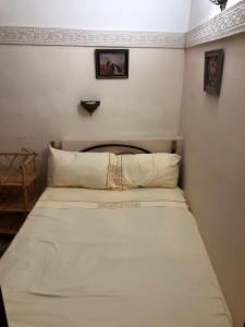 Postel nebo postele na pokoji v ubytování Dar Lalla Wafae