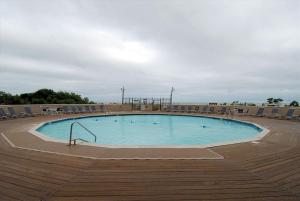 a large swimming pool with chairs in a parking lot at Highpoint S 6H in Ocean City