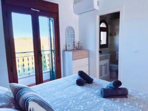 Posteľ alebo postele v izbe v ubytovaní Casa Beth Villamartin 2 Bedroom/ 2 Bathroom with Pool