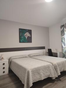 Кровать или кровати в номере Casa Luzon, terraza-solarium con ducha y salon rustico