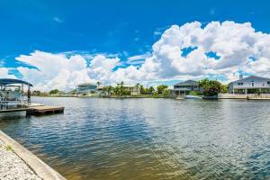 a view of a river with houses and condos at Direct gulf access with boat dock minutes from Weechi Wachee in Hernando Beach