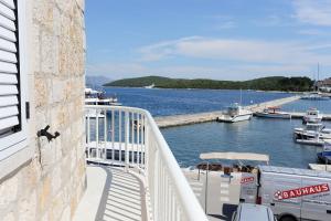 a view of a marina with boats in the water at Apartments by the sea Korcula - 6016 in Korčula