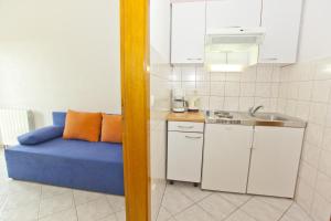 Fotografia z galérie ubytovania Apartments and rooms by the sea Brela, Makarska - 6056 v destinácii Brela