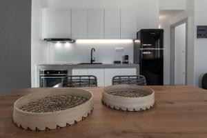 A kitchen or kitchenette at Manesis Suites