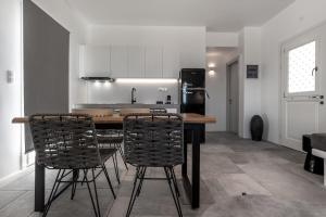 A kitchen or kitchenette at Manesis Suites