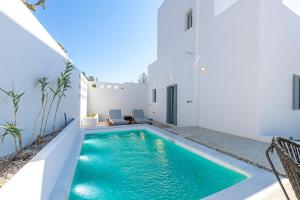The swimming pool at or close to Manesis Suites