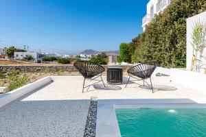 The swimming pool at or close to Manesis Suites