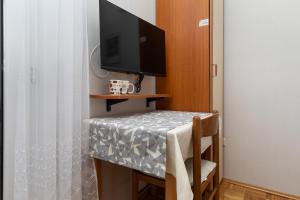 Televízia a/alebo spoločenská miestnosť v ubytovaní Apartment Duce 5973b