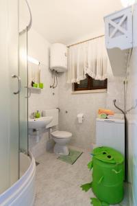 A bathroom at Holiday house with a parking space Postira, Brac - 6052
