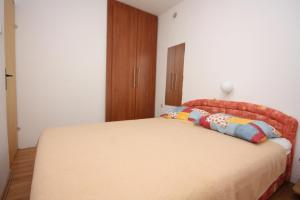 Posteľ alebo postele v izbe v ubytovaní Apartment Nin 6149b