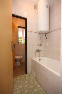 Kúpeľňa v ubytovaní Apartment Nin 6149b + 17 fotografií