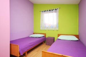Posteľ alebo postele v izbe v ubytovaní Apartments by the sea Pakostane, Biograd - 6161