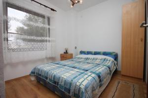 Posteľ alebo postele v izbe v ubytovaní Apartments with parking spaces Bibinje, Zadar - 6160