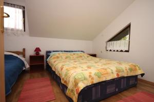 Posteľ alebo postele v izbe v ubytovaní Apartments with parking spaces Bibinje, Zadar - 6160