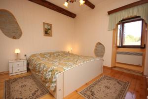 Postel nebo postele na pokoji v ubytování Holiday house with a swimming pool Cepic, Central Istria - Sredisnja Istra - 7403 + 11 fotografií