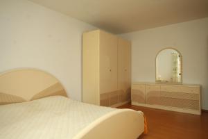 Posteľ alebo postele v izbe v ubytovaní Apartment Premantura 7462b