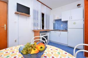 Kuchyňa alebo kuchynka v ubytovaní Apartment Pisak 7521c