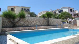 Fotografia z galérie ubytovania Family friendly apartments with a swimming pool Razanj, Rogoznica - 7606 v Ražanji + 33 fotografií