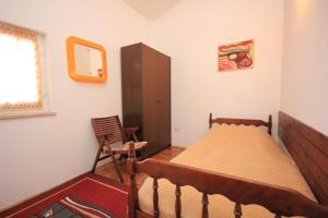 Postel nebo postele na pokoji v ubytování Holiday apartments Pjescana Uvala, Pula - 7652