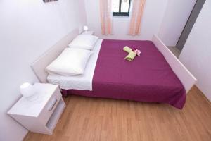Postel nebo postele na pokoji v ubytování Seaside secluded apartments Cove Pobij, Hvar - 7506