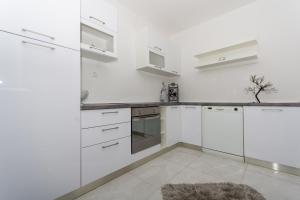 Fotografia z galérie ubytovania Apartments by the sea Okrug Gornji, Ciovo - 6078 v Trogiri