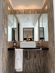 a bathroom with a sink and a mirror at Tierras del Norte in Salta