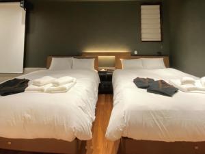 Postel nebo postele na pokoji v ubytování LAVA SAUNA &VILLA
