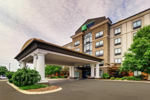 a rendering of a hotel with a building at Holiday Inn Express Nashville-Opryland, an IHG Hotel in Nashville