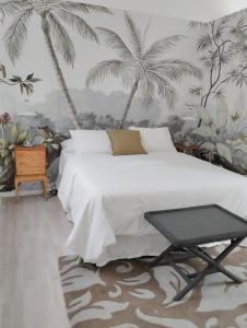 Ein Bett oder Betten in einem Zimmer der Unterkunft Luisan Guanarteme